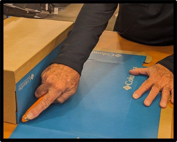 An image illustrating how to cut the front flap off the box top